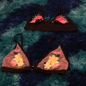 2 pink bras with flowers in a bundle